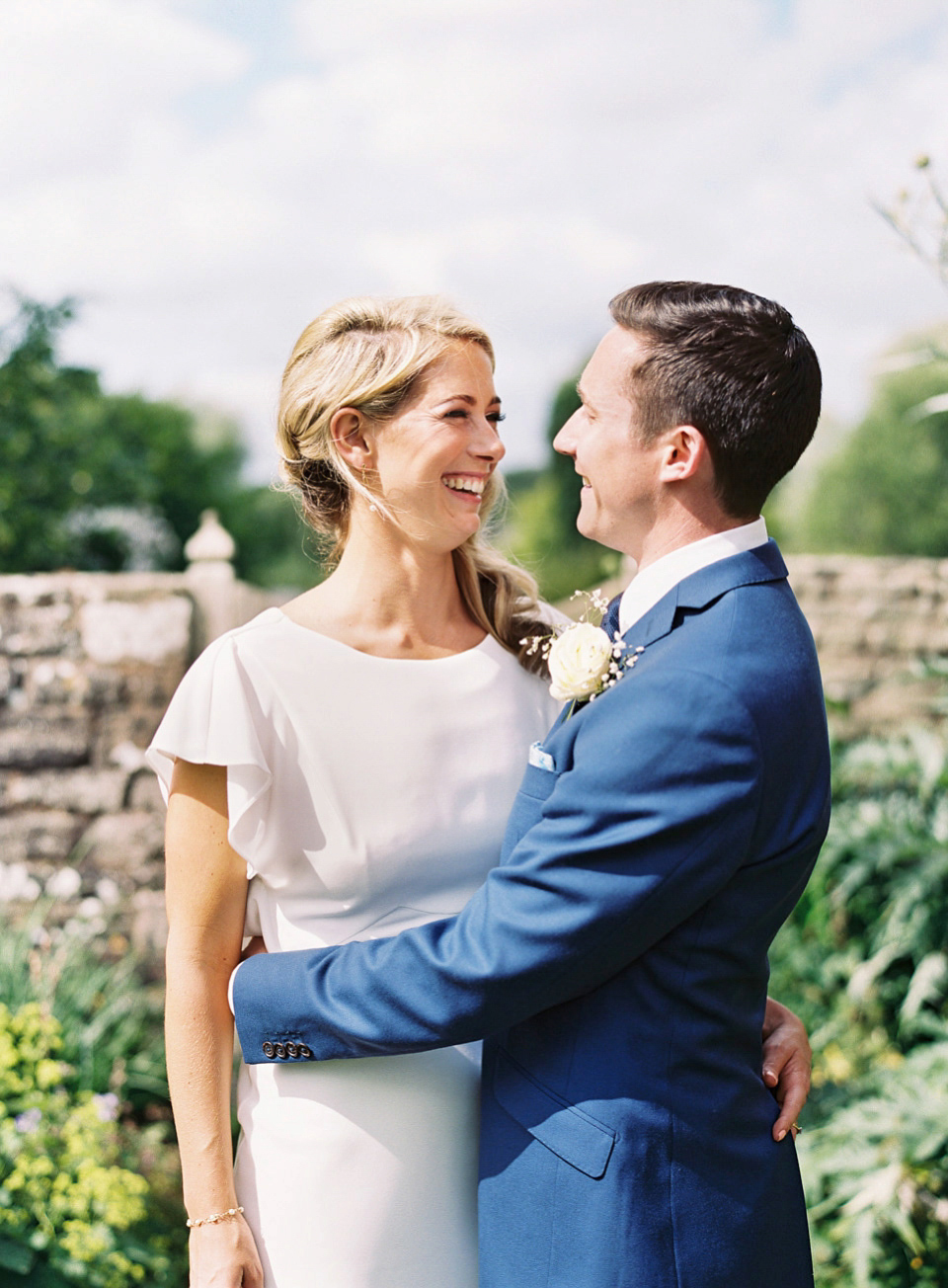 David Fielden elegance for a green and white country garden wedding at Dewsall Court. Fine art film photography by David Jenkins.