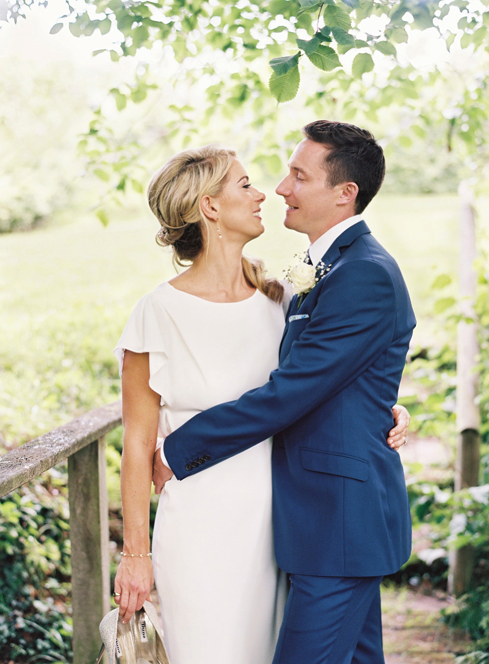 David Fielden elegance for a green and white country garden wedding at Dewsall Court. Fine art film photography by David Jenkins.