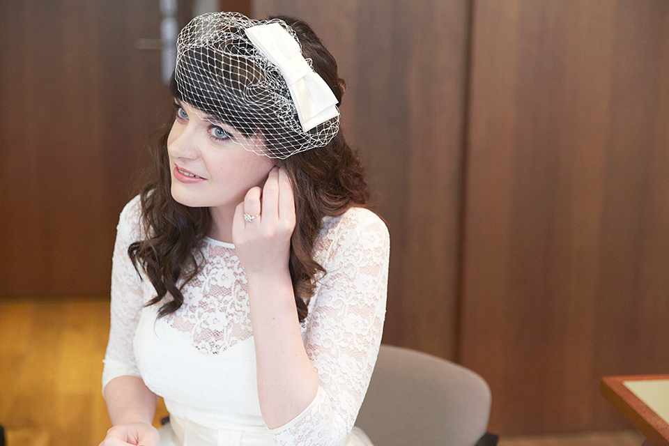 A 50's inspired tea-length dress for a pastel colour London pub wedding. Photography by Natalie J. Weddings.