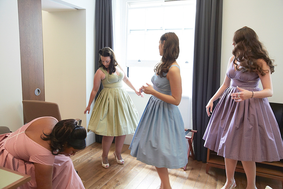 A 50's inspired tea-length dress for a pastel colour London pub wedding. Photography by Natalie J. Weddings.