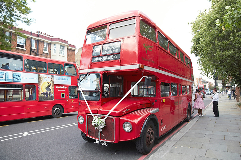 A 50's inspired tea-length dress for a pastel colour London pub wedding. Photography by Natalie J. Weddings.