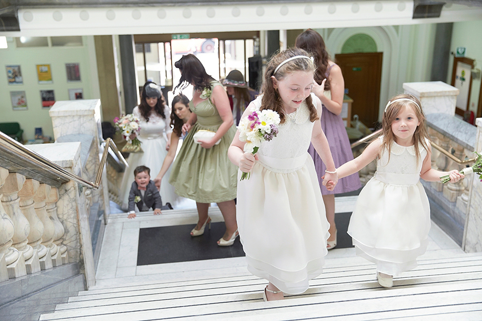 A 50's inspired tea-length dress for a pastel colour London pub wedding. Photography by Natalie J. Weddings.