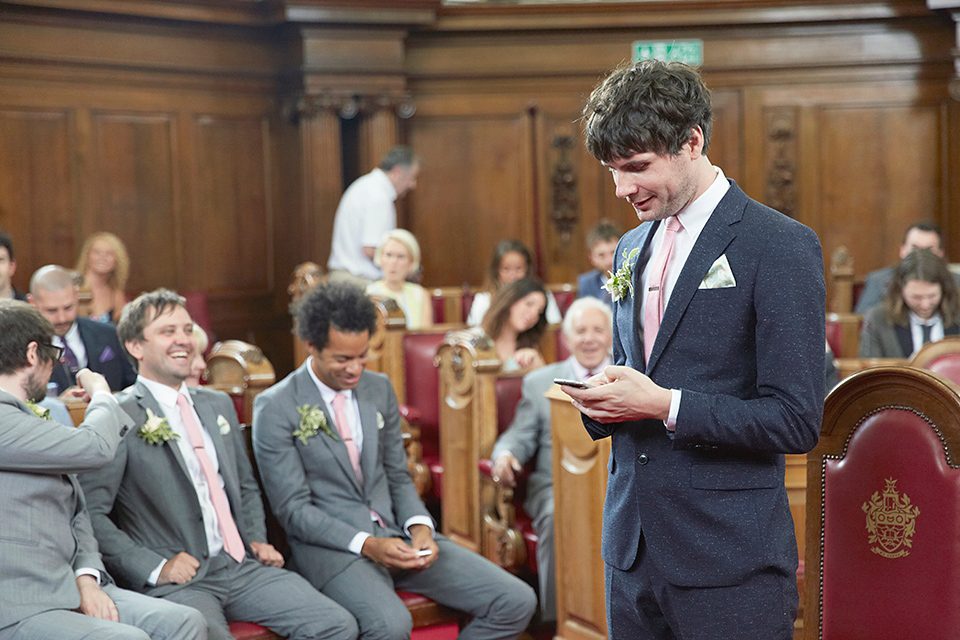 A 50's inspired tea-length dress for a pastel colour London pub wedding. Photography by Natalie J. Weddings.