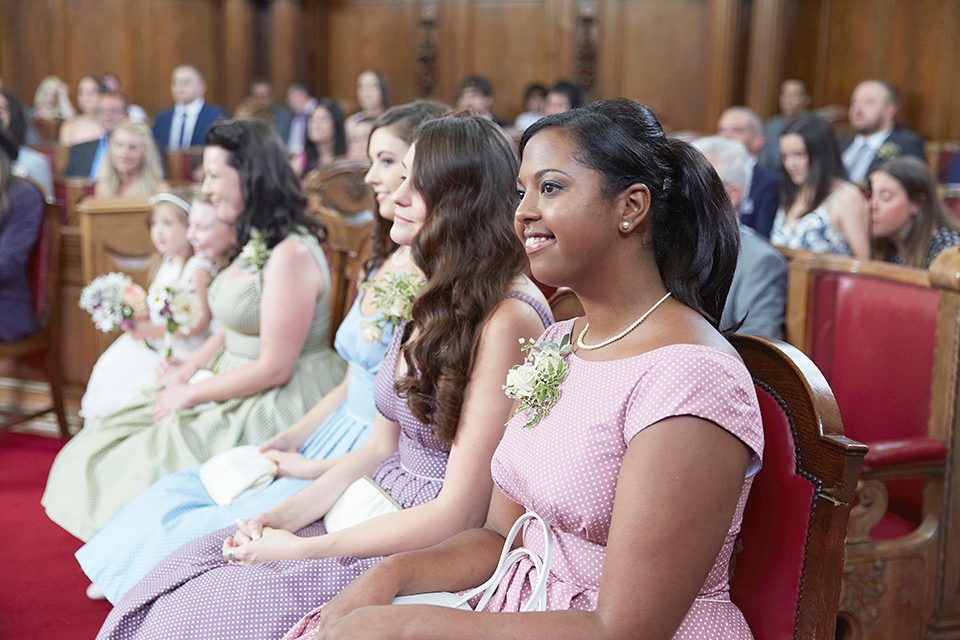 A 50's inspired tea-length dress for a pastel colour London pub wedding. Photography by Natalie J. Weddings.