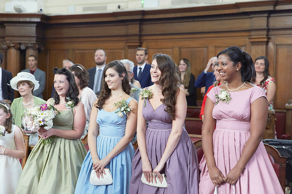 A 50's inspired tea-length dress for a pastel colour London pub wedding. Photography by Natalie J. Weddings.