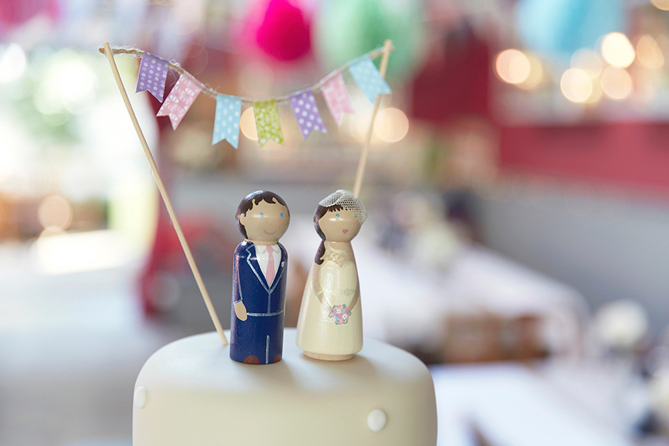 A 50's inspired tea-length dress for a pastel colour London pub wedding. Photography by Natalie J. Weddings.