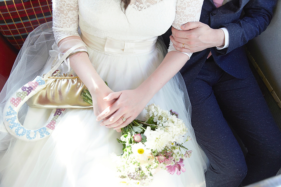 A 50's inspired tea-length dress for a pastel colour London pub wedding. Photography by Natalie J. Weddings.