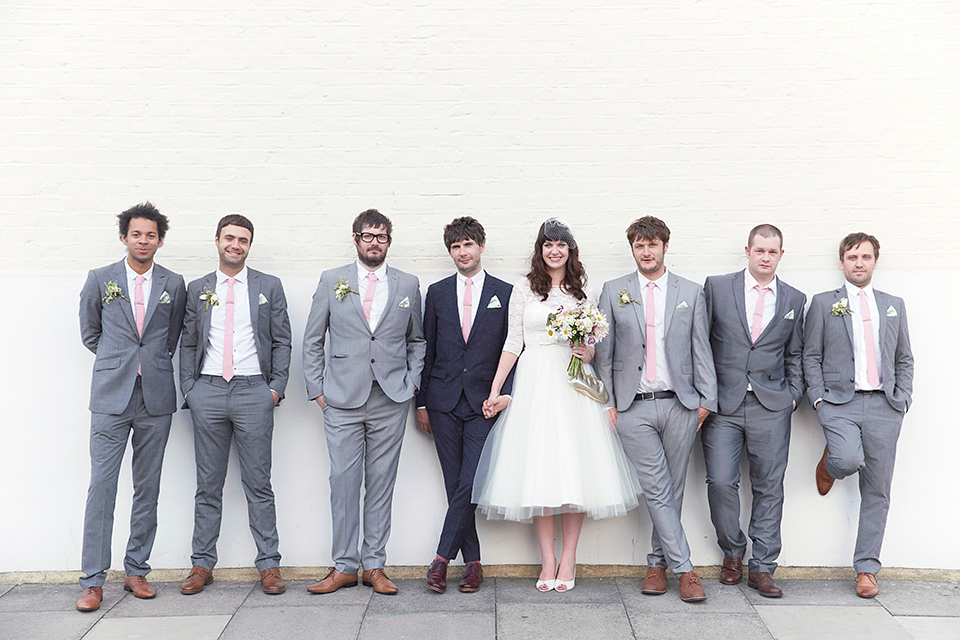 A 50's inspired tea-length dress for a pastel colour London pub wedding. Photography by Natalie J. Weddings.