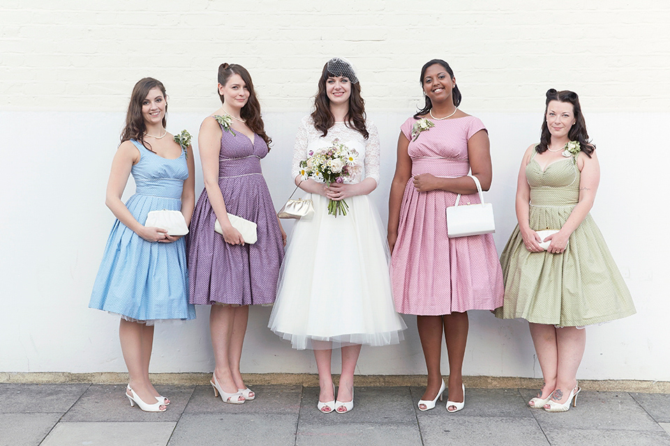 A 50's inspired tea-length dress for a pastel colour London pub wedding. Photography by Natalie J. Weddings.