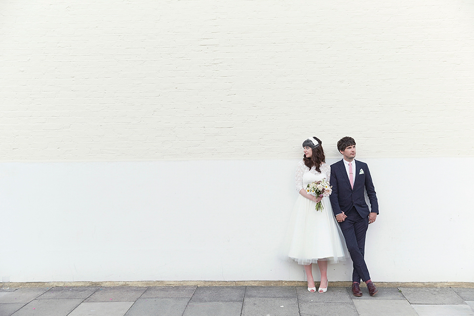 A 50's inspired tea-length dress for a pastel colour London pub wedding. Photography by Natalie J. Weddings.