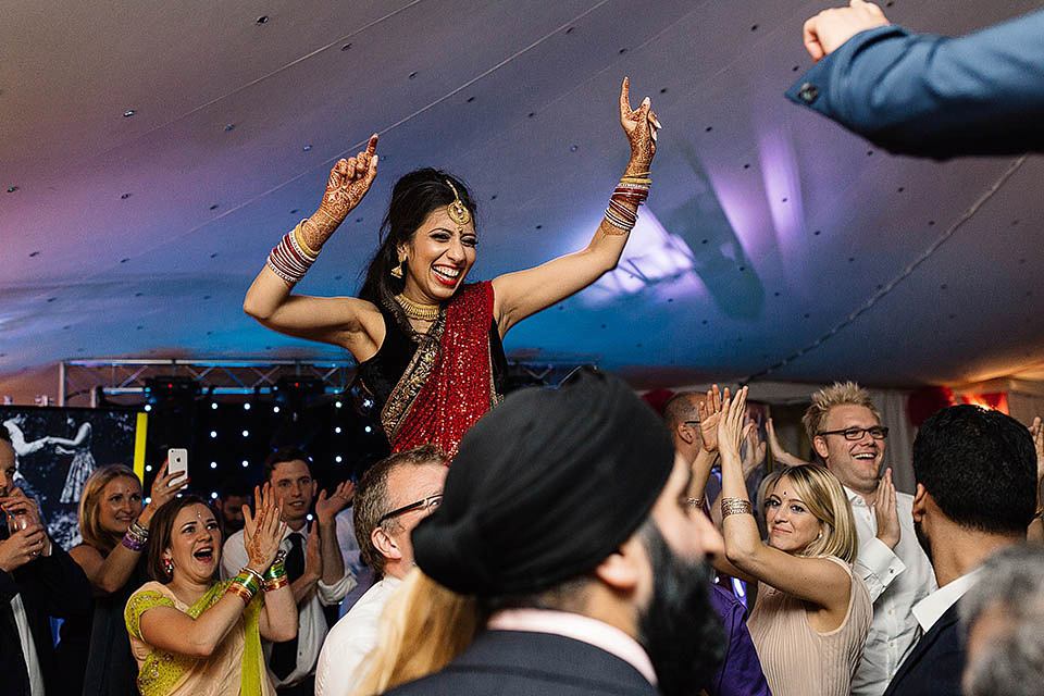 A colourful, multi-faith wedding at Scampston Hall North Yorkshire. Photography by Paul Joseph.