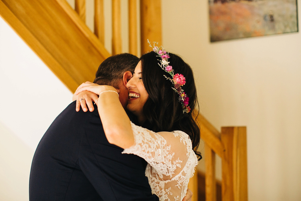 Leila wore a bespoke gown by dressmaker Dana Bolton for her rustic, homespun Autumn barn wedding. Photography by Richard Skins.