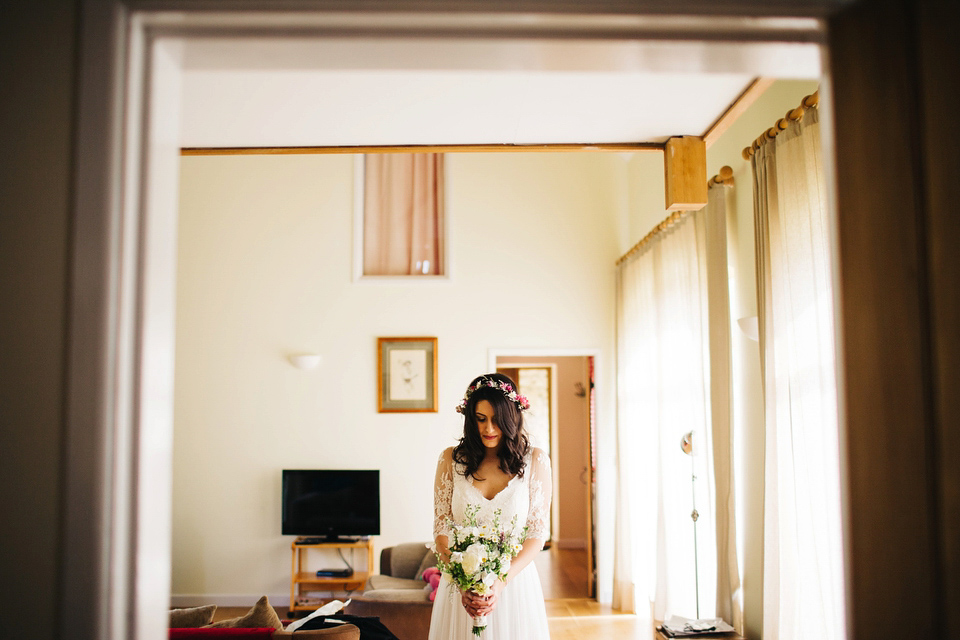 Leila wore a bespoke gown by dressmaker Dana Bolton for her rustic, homespun Autumn barn wedding. Photography by Richard Skins.