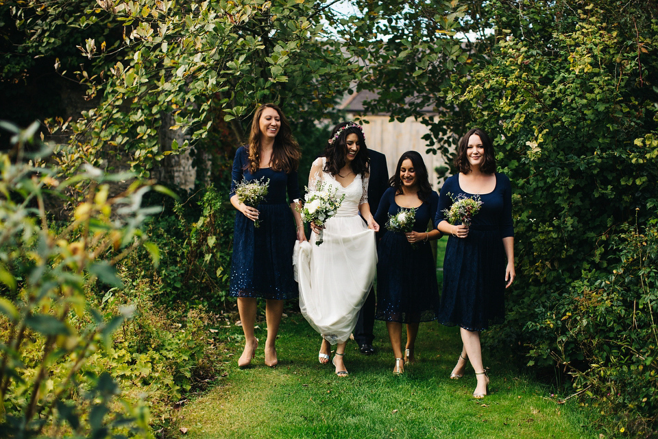 Leila wore a bespoke gown by dressmaker Dana Bolton for her rustic, homespun Autumn barn wedding. Photography by Richard Skins.