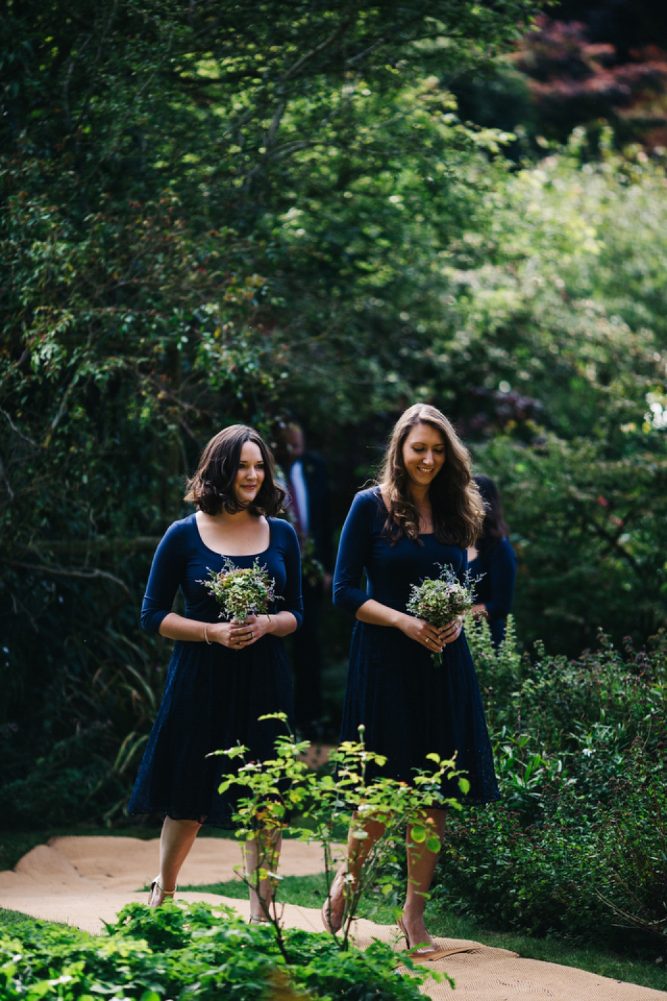 Leila wore a bespoke gown by dressmaker Dana Bolton for her rustic, homespun Autumn barn wedding. Photography by Richard Skins.