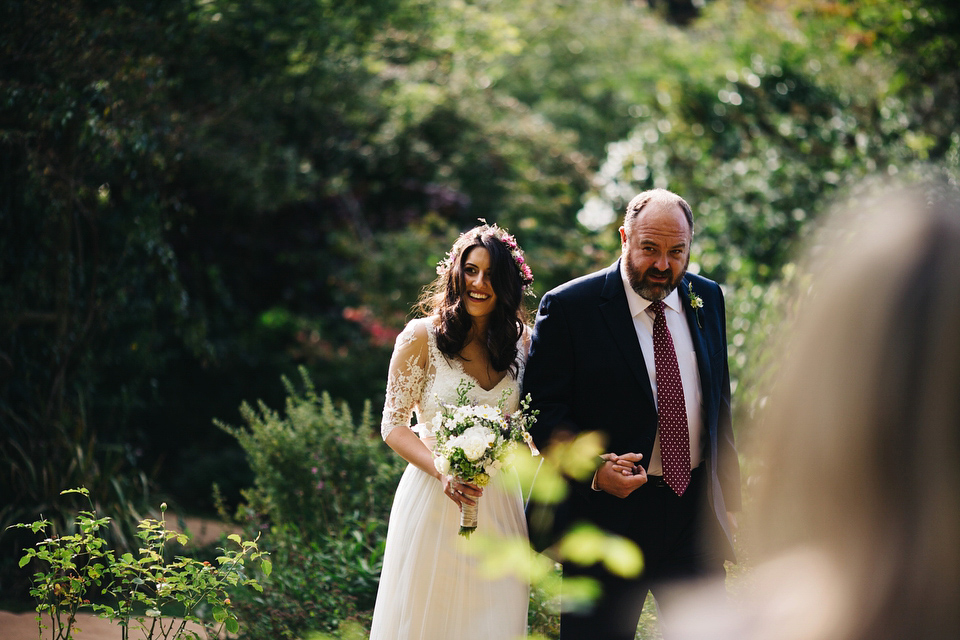 Leila wore a bespoke gown by dressmaker Dana Bolton for her rustic, homespun Autumn barn wedding. Photography by Richard Skins.