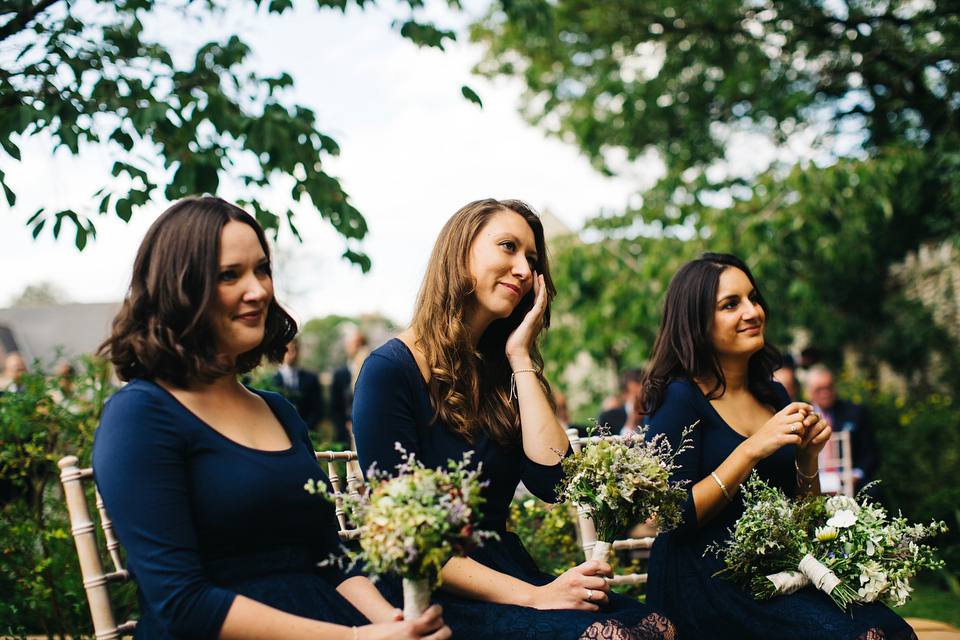 Leila wore a bespoke gown by dressmaker Dana Bolton for her rustic, homespun Autumn barn wedding. Photography by Richard Skins.