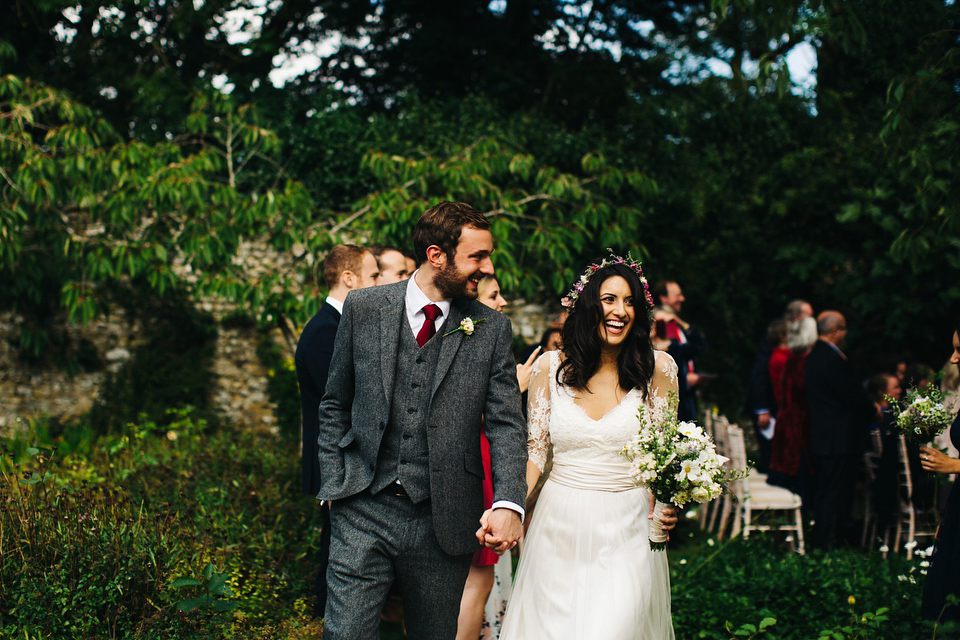 Leila wore a bespoke gown by dressmaker Dana Bolton for her rustic, homespun Autumn barn wedding. Photography by Richard Skins.