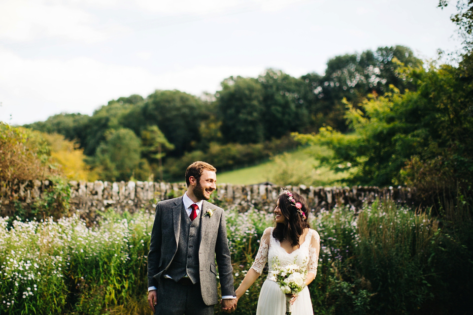 Leila wore a bespoke gown by dressmaker Dana Bolton for her rustic, homespun Autumn barn wedding. Photography by Richard Skins.