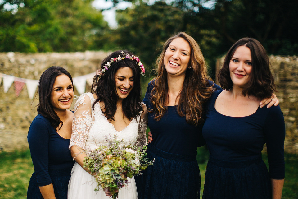 Leila wore a bespoke gown by dressmaker Dana Bolton for her rustic, homespun Autumn barn wedding. Photography by Richard Skins.