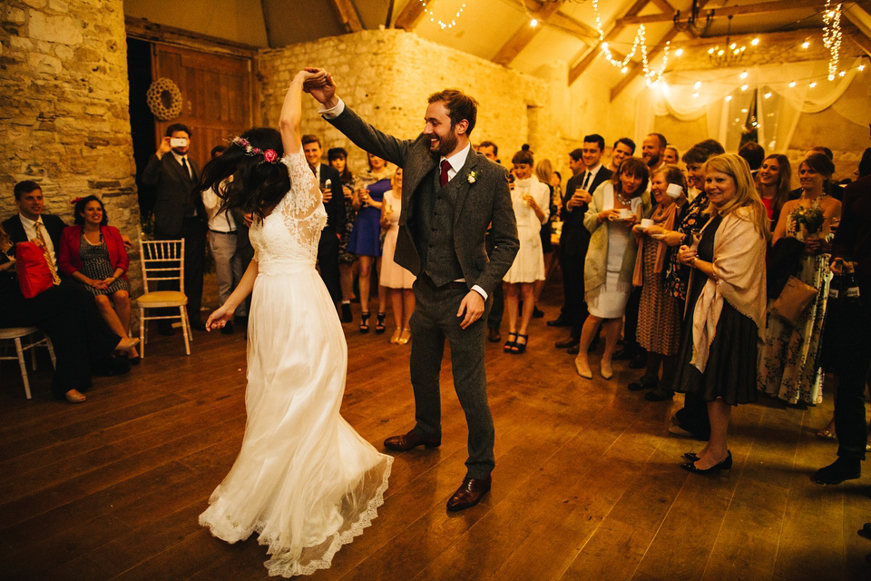 Leila wore a bespoke gown by dressmaker Dana Bolton for her rustic, homespun Autumn barn wedding. Photography by Richard Skins.