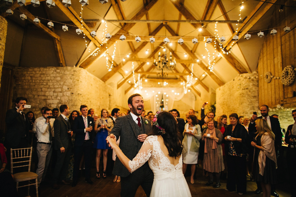 Leila wore a bespoke gown by dressmaker Dana Bolton for her rustic, homespun Autumn barn wedding. Photography by Richard Skins.