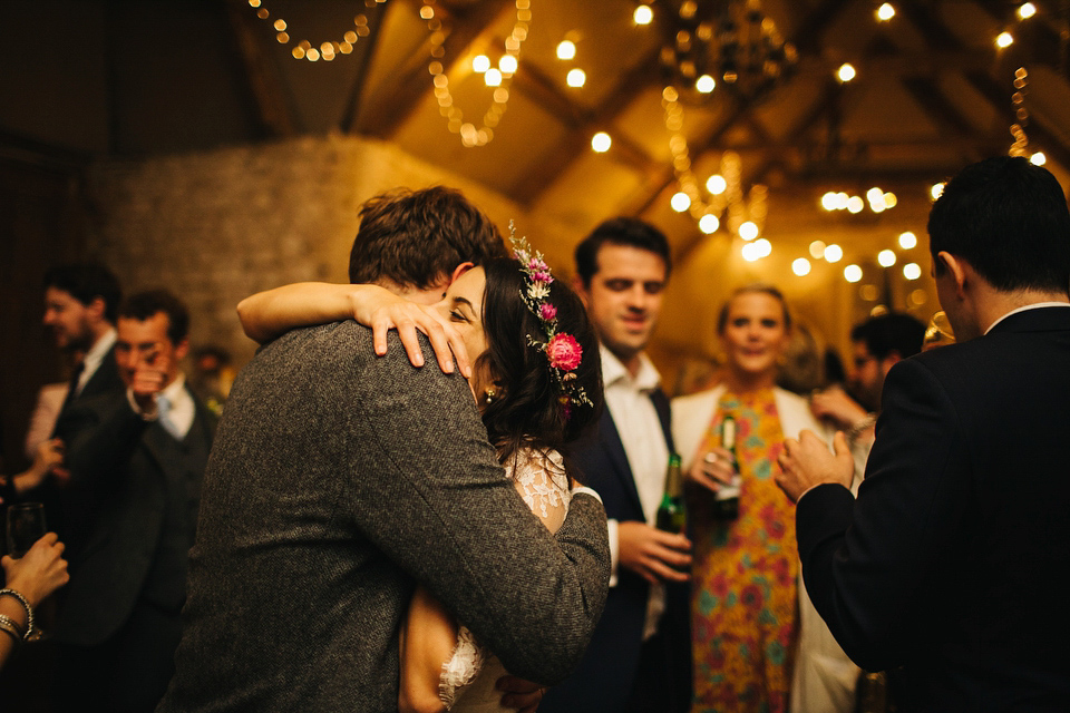 Leila wore a bespoke gown by dressmaker Dana Bolton for her rustic, homespun Autumn barn wedding. Photography by Richard Skins.