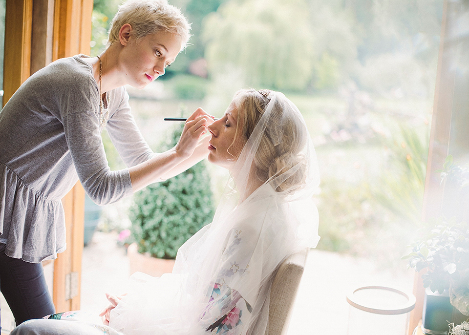 Jenny Packham glamour for a pale green pub wedding in Sussex. Photography by Razia N. Jukes.