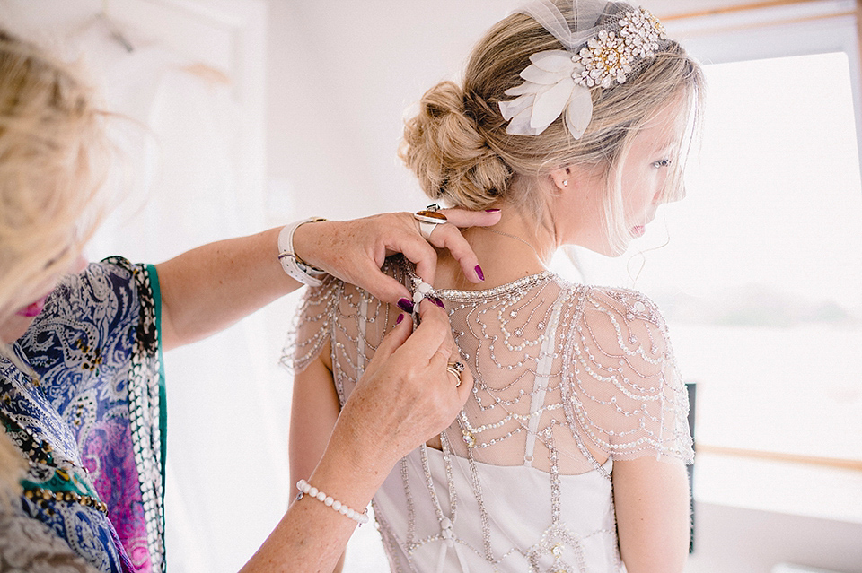 Jenny Packham glamour for a pale green pub wedding in Sussex. Photography by Razia N. Jukes.