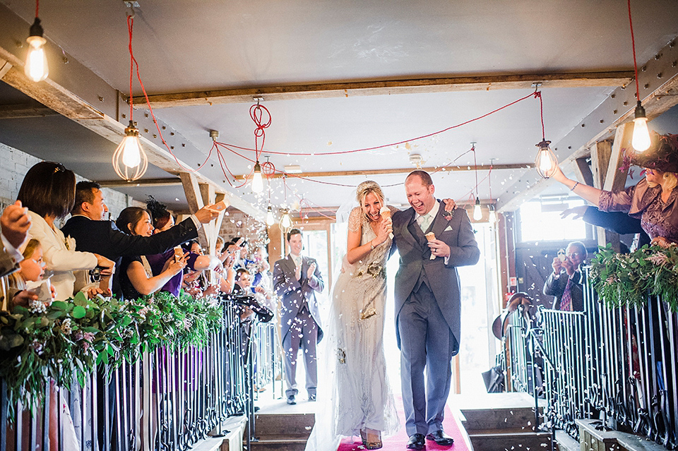 Jenny Packham glamour for a pale green pub wedding in Sussex. Photography by Razia N. Jukes.