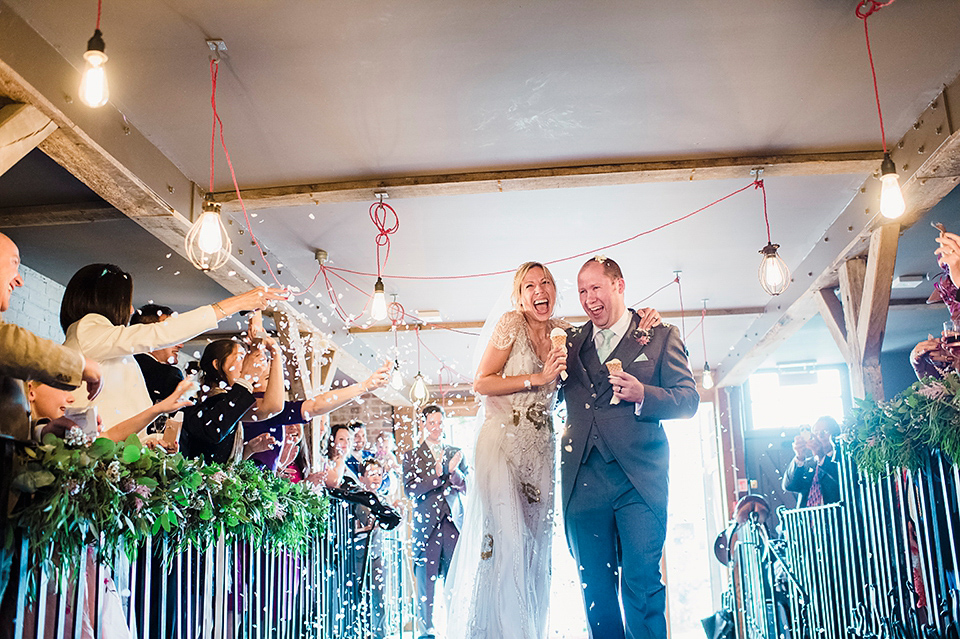 Jenny Packham glamour for a pale green pub wedding in Sussex. Photography by Razia N. Jukes.