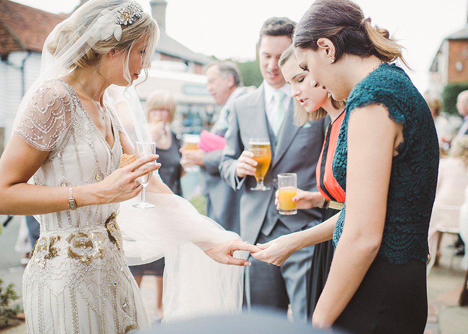 Jenny Packham glamour for a pale green pub wedding in Sussex. Photography by Razia N. Jukes.