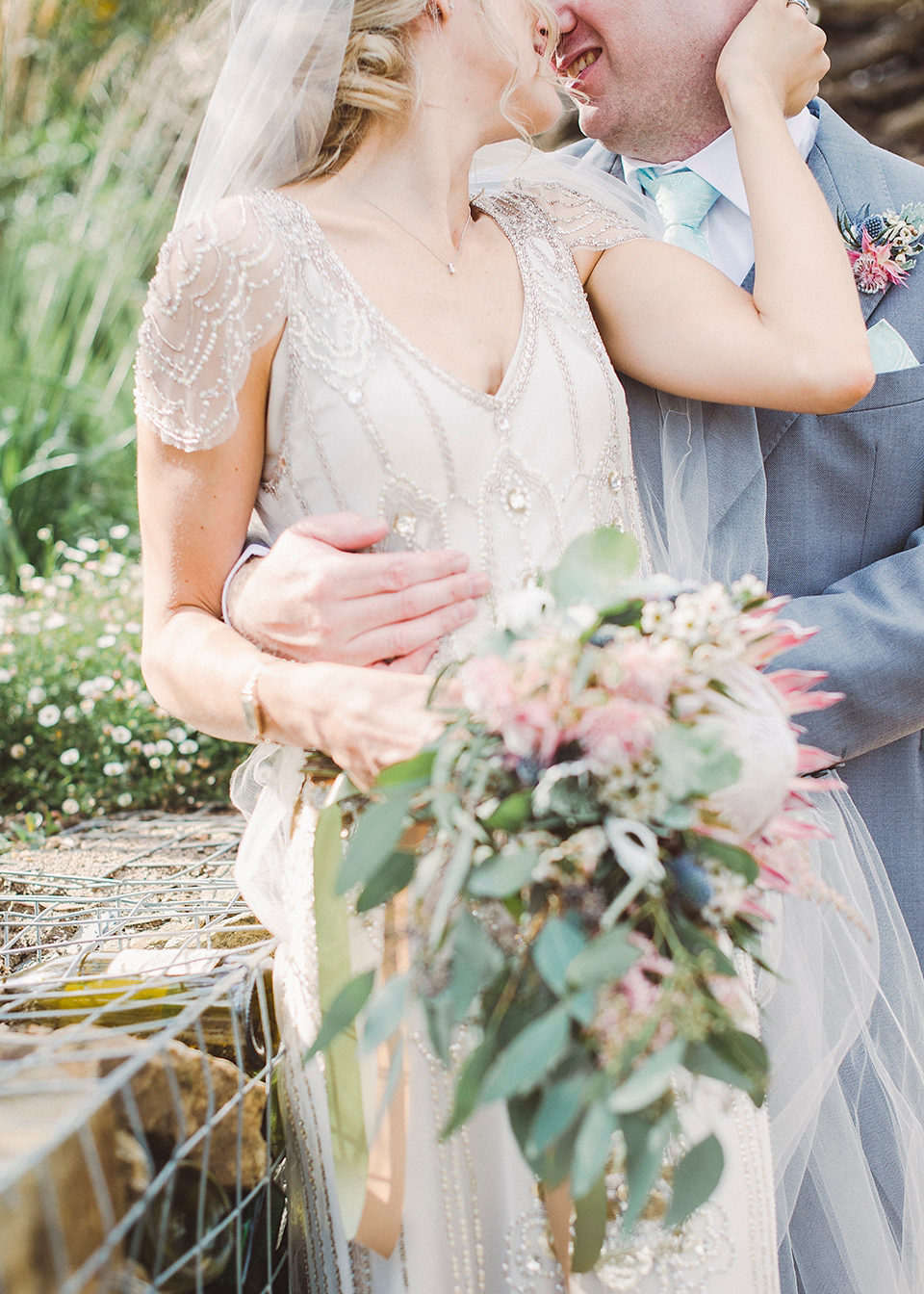 Jenny Packham glamour for a pale green pub wedding in Sussex. Photography by Razia N. Jukes.