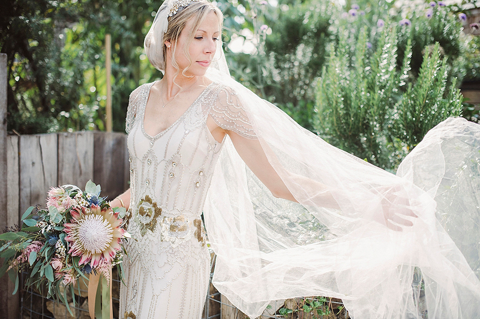 Jenny Packham glamour for a pale green pub wedding in Sussex. Photography by Razia N. Jukes.