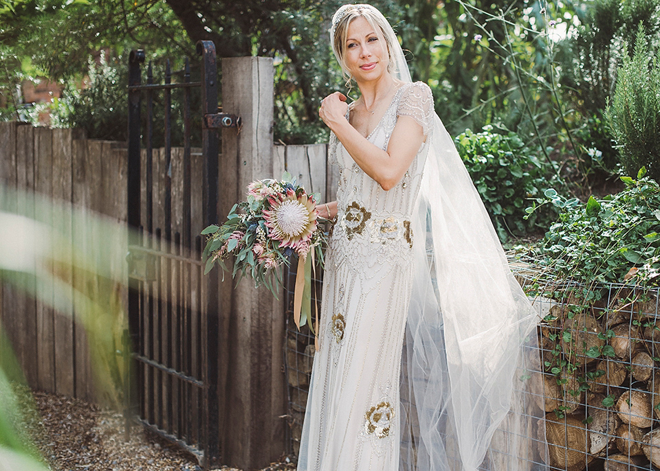 Jenny Packham glamour for a pale green pub wedding in Sussex. Photography by Razia N. Jukes.