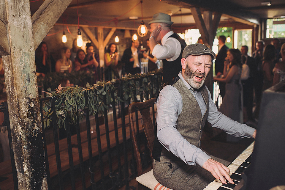 Jenny Packham glamour for a pale green pub wedding in Sussex. Photography by Razia N. Jukes.