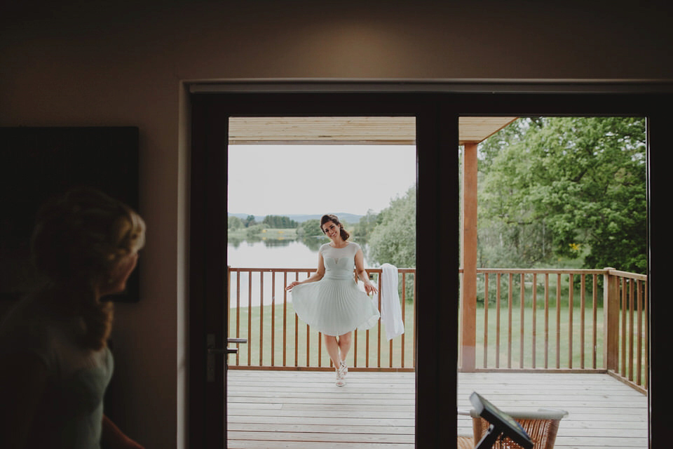 A David Fielden gown for a relaxed and nature inspired Humanist wedding at Coo Cathedral in the Scottish Highlands. Photography by The Curries.