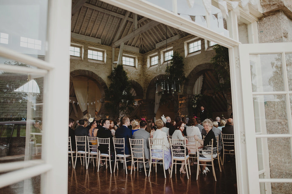 A David Fielden gown for a relaxed and nature inspired Humanist wedding at Coo Cathedral in the Scottish Highlands. Photography by The Curries.