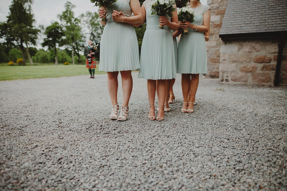 A David Fielden gown for a relaxed and nature inspired Humanist wedding at Coo Cathedral in the Scottish Highlands. Photography by The Curries.