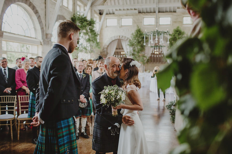 A David Fielden gown for a relaxed and nature inspired Humanist wedding at Coo Cathedral in the Scottish Highlands. Photography by The Curries.