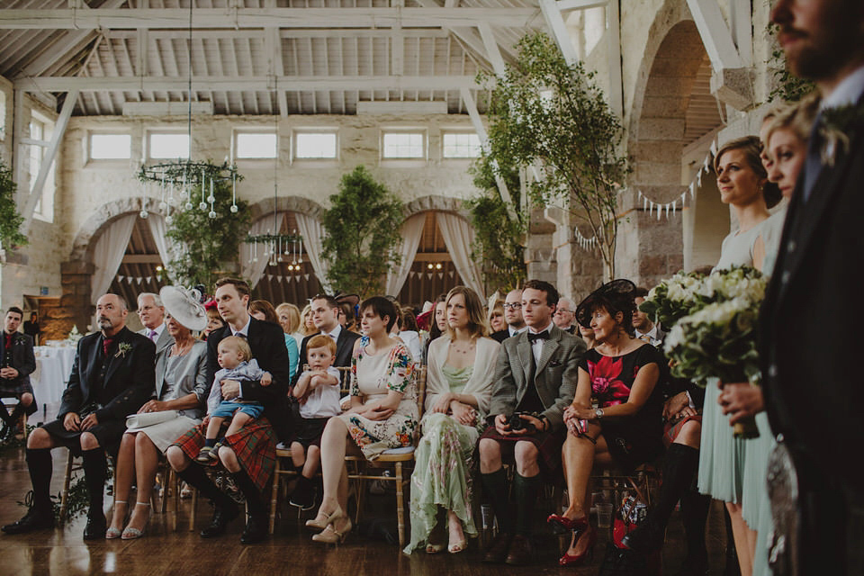 A David Fielden gown for a relaxed and nature inspired Humanist wedding at Coo Cathedral in the Scottish Highlands. Photography by The Curries.