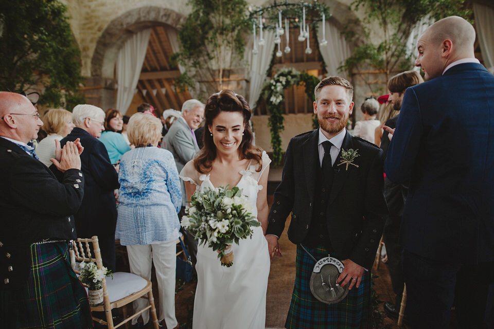 A David Fielden gown for a relaxed and nature inspired Humanist wedding at Coo Cathedral in the Scottish Highlands. Photography by The Curries.