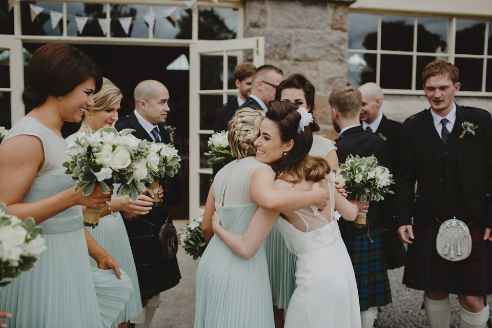 A David Fielden gown for a relaxed and nature inspired Humanist wedding at Coo Cathedral in the Scottish Highlands. Photography by The Curries.