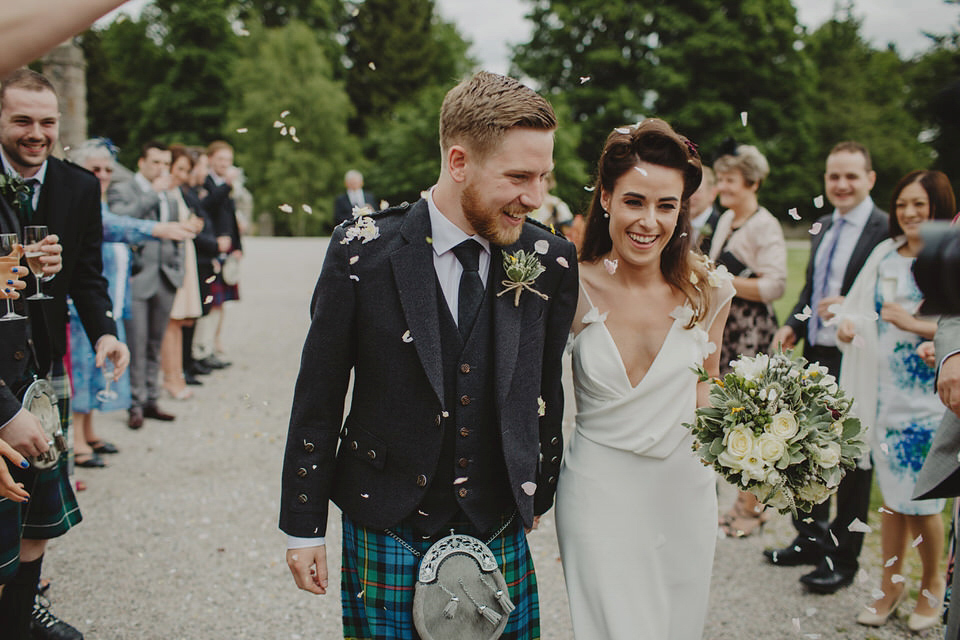 A David Fielden gown for a relaxed and nature inspired Humanist wedding at Coo Cathedral in the Scottish Highlands. Photography by The Curries.