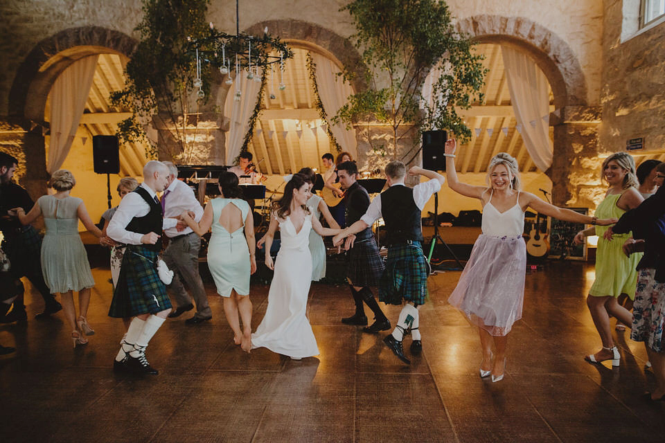 A David Fielden gown for a relaxed and nature inspired Humanist wedding at Coo Cathedral in the Scottish Highlands. Photography by The Curries.