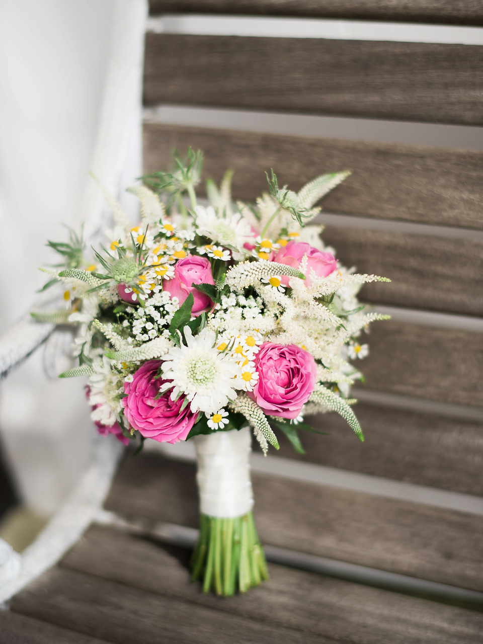 Verity wears a Halfpenny London gown for her garden party inspired wedding by the sea. Photography by John Barwood.