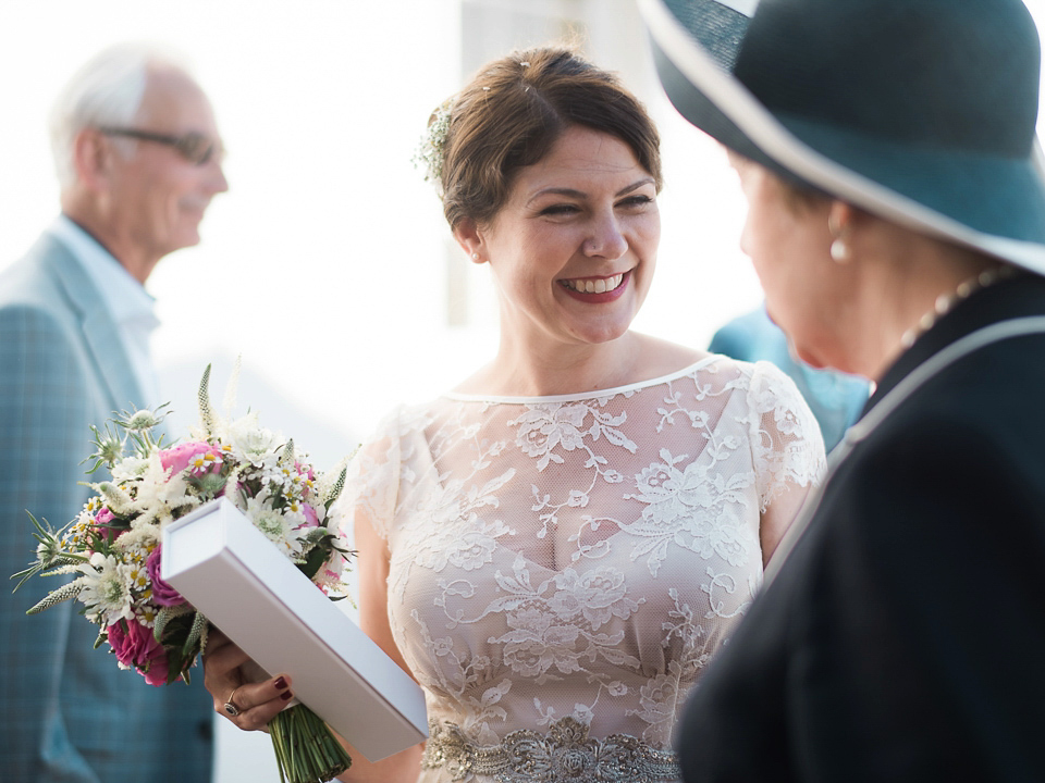 Verity wears a Halfpenny London gown for her garden party inspired wedding by the sea. Photography by John Barwood.