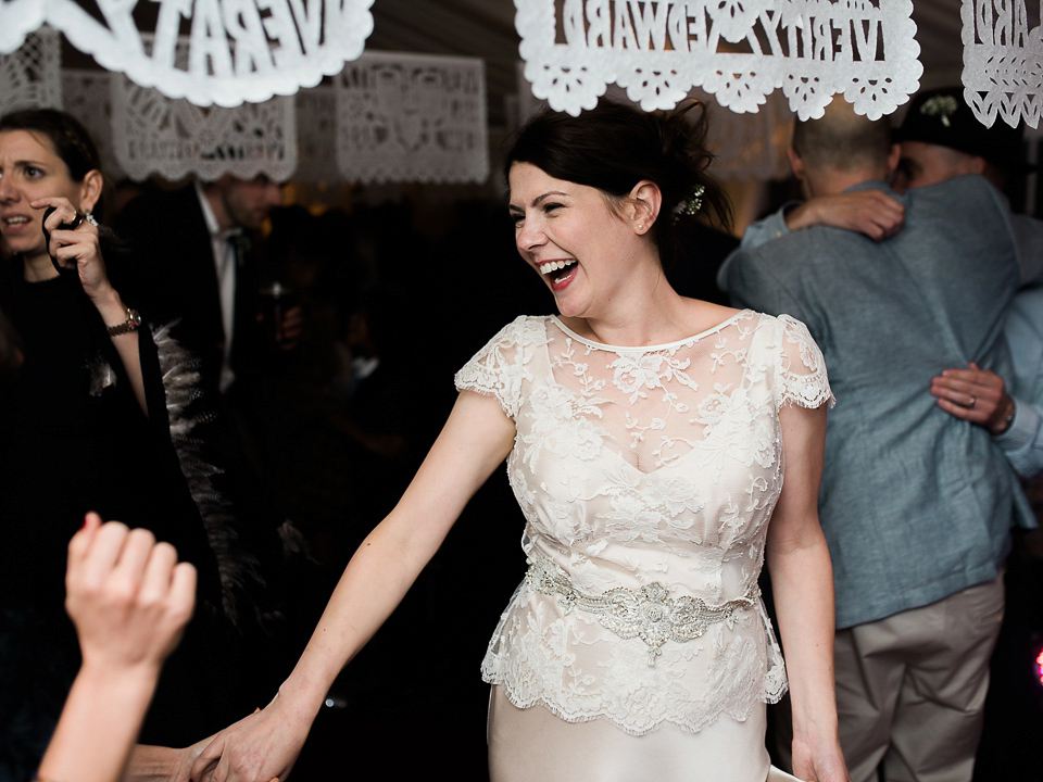 Verity wears a Halfpenny London gown for her garden party inspired wedding by the sea. Photography by John Barwood.