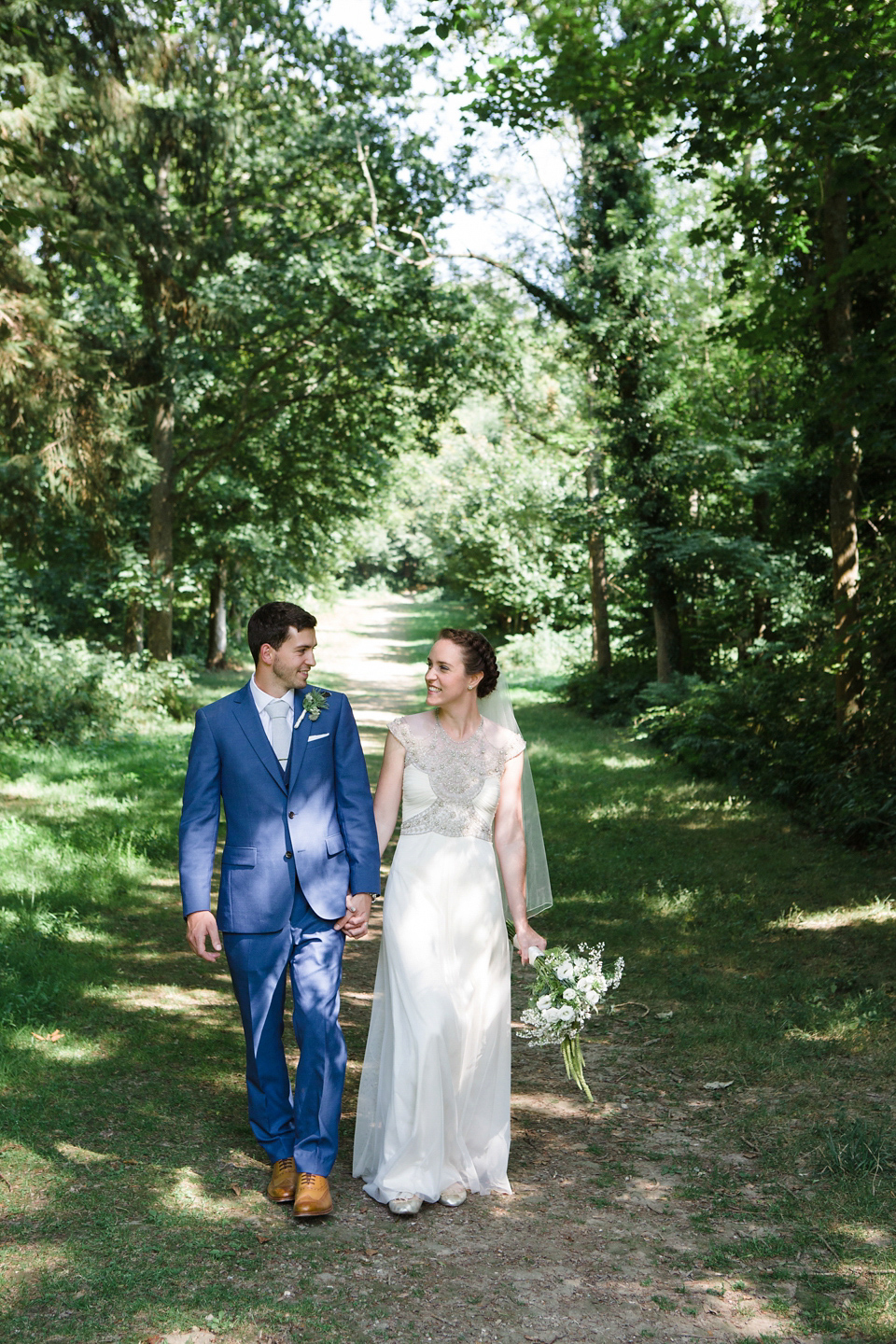 A glamorous Gwendolynne gown for a Summer garden party wedding. Photography by Lucy Davenport.