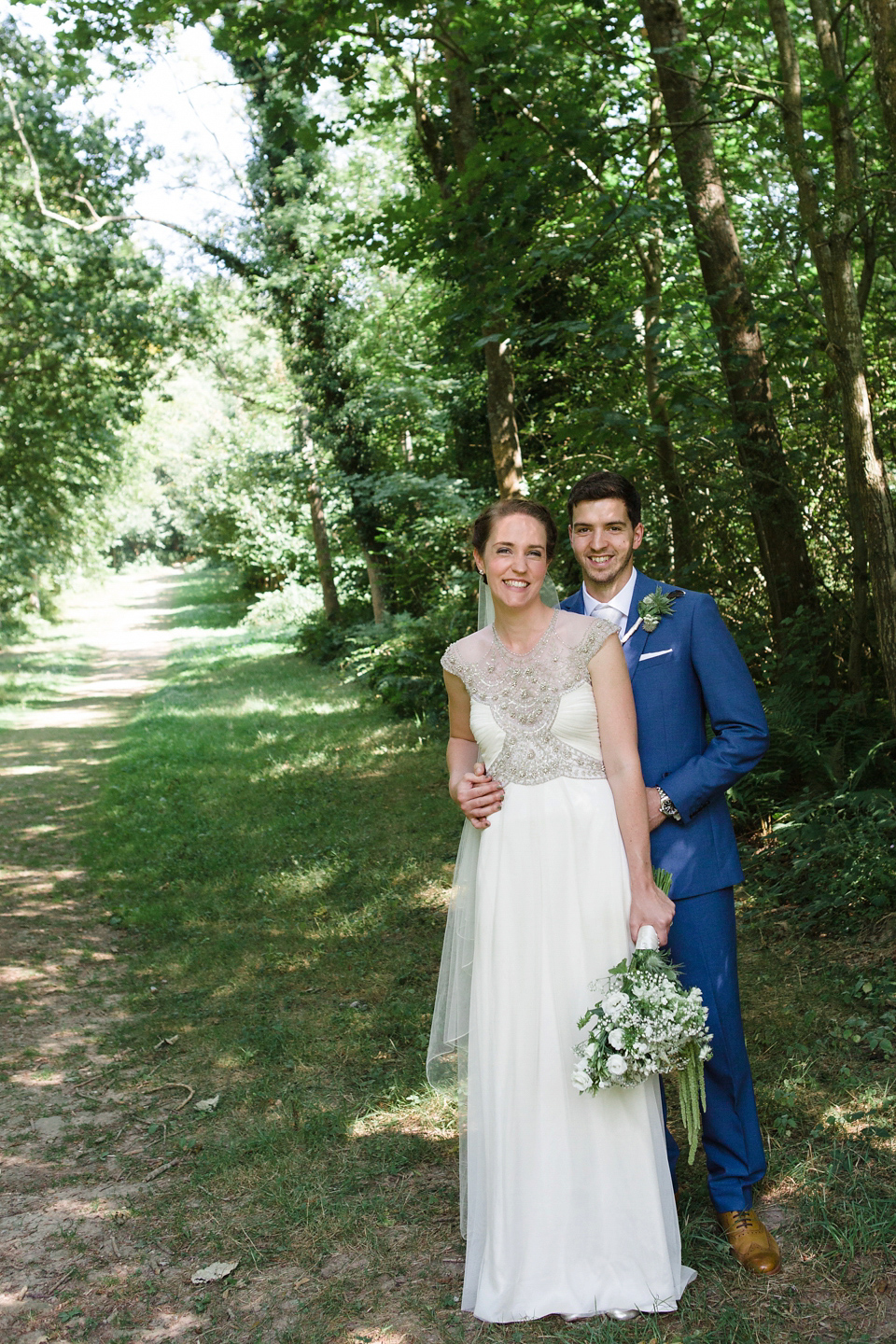 A glamorous Gwendolynne gown for a Summer garden party wedding. Photography by Lucy Davenport.